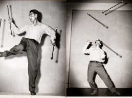 Robert Olmstead twirling three batons. From juggling to the creation of baton twirling.